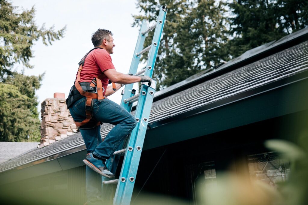 happy homeowner satisfied with roof repair